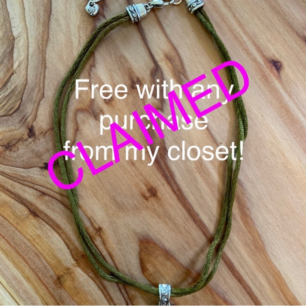 Corded necklace with fun gem and silver detail